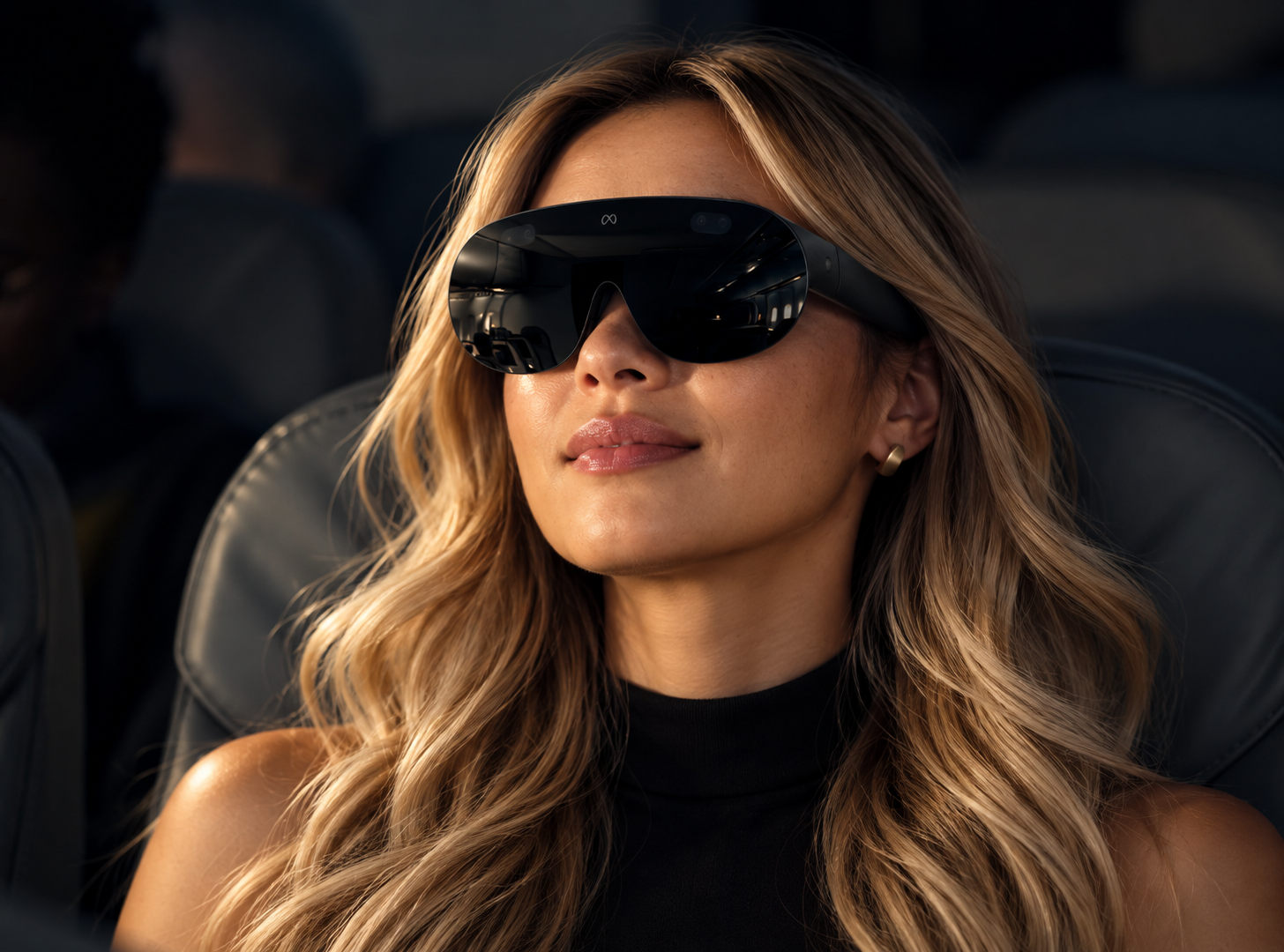 A woman wearing a mixed-reality headset in a lounge.